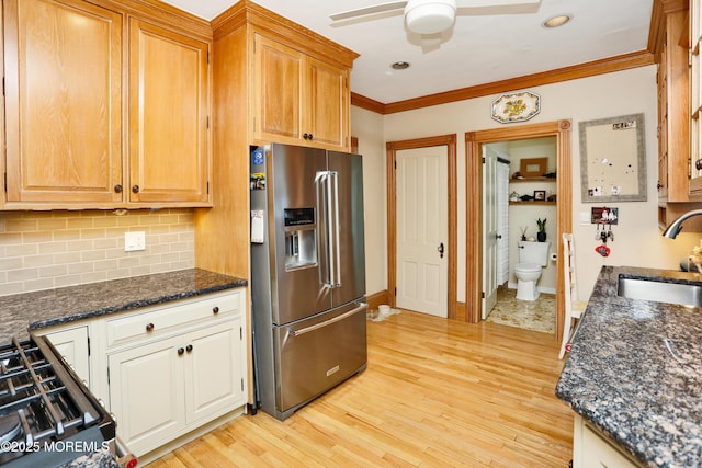 85 Virginia Ave, Manasquan, NJ 08736 - kitchen featuring stainless steel refrigerator with ice dispenser, a sink, a ceiling fan, crown molding, and light wood-type flooring