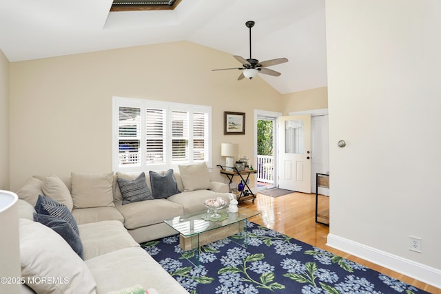 85 Virginia Ave, Manasquan, NJ 08736 - living room featuring a skylight, a ceiling fan, wood finished floors, baseboards, and high vaulted ceiling