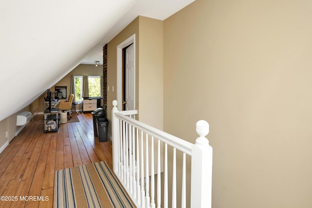 85 Virginia Ave, Manasquan, NJ 08736 - corridor featuring an upstairs landing, vaulted ceiling, hardwood / wood-style flooring, and baseboards