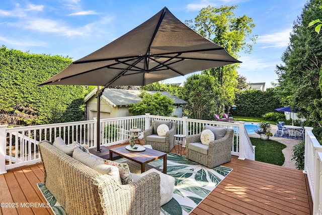 85 Virginia Ave, Manasquan, NJ 08736 - wooden deck featuring an outdoor hangout area and an outdoor structure
