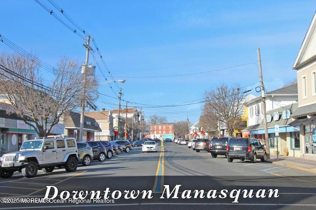 85 Virginia Ave, Manasquan, NJ 08736 - view of asphalt road featuring street lighting