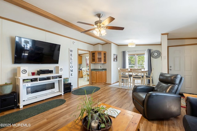 1400 Forest Way, Whiting, NJ 08759 - living area featuring light wood-style floors, crown molding, and a ceiling fan