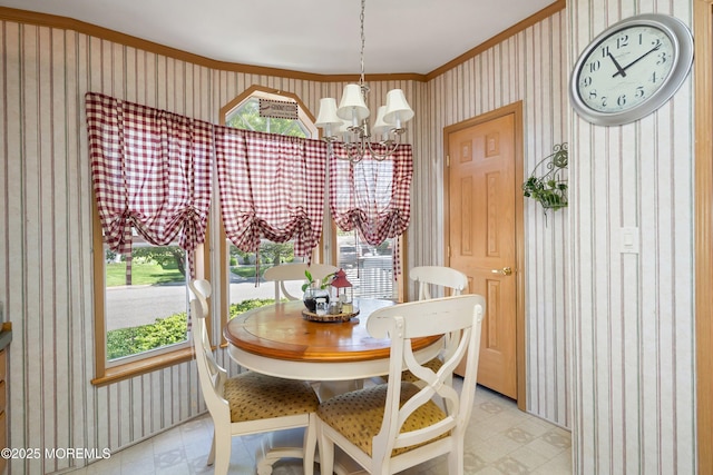 1400 Forest Way, Whiting, NJ 08759 - dining space featuring wallpapered walls, light floors, a chandelier, ornamental molding, and plenty of natural light