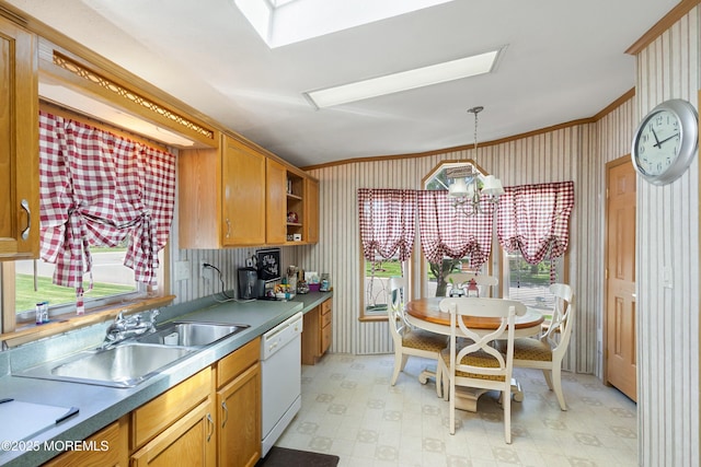 1400 Forest Way, Whiting, NJ 08759 - kitchen featuring dishwasher, light flooring, a sink, a skylight, and ornamental molding