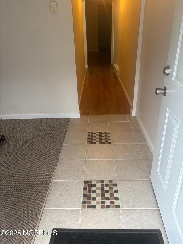 6 Ardmore St Unit A, Whiting, NJ 08759 - hallway featuring tile patterned floors and baseboards