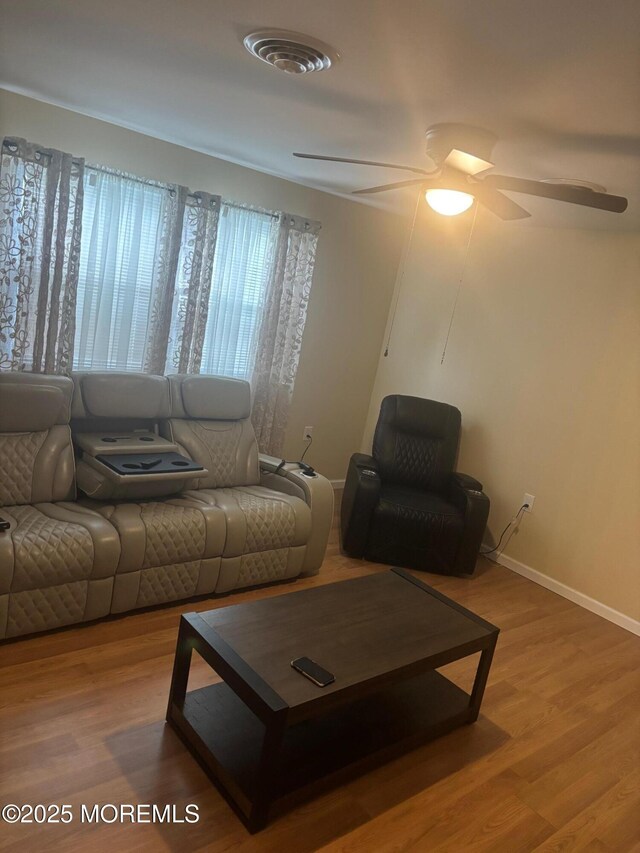 6 Ardmore St Unit A, Whiting, NJ 08759 - living room with wood finished floors, ceiling fan, and baseboards
