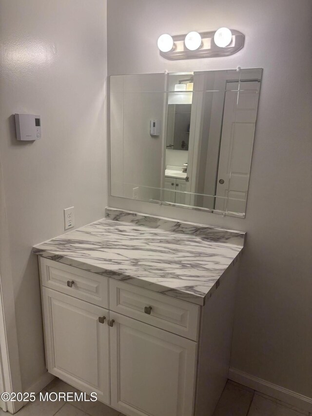 6 Ardmore St Unit A, Whiting, NJ 08759 - bathroom featuring vanity, tile patterned flooring, and baseboards