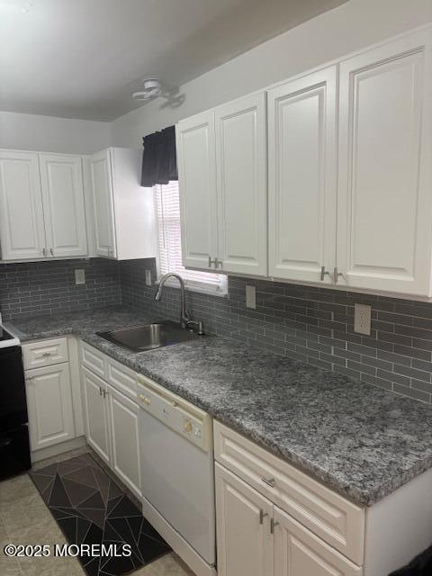 6 Ardmore St Unit A, Whiting, NJ 08759 - kitchen with white dishwasher, a sink, range with electric cooktop, and white cabinets