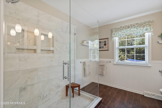5 Persimmon Dr, Jackson, NJ 08527 - bathroom featuring a stall shower, wood finished floors, a wainscoted wall, and toilet
