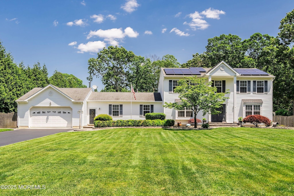 5 Persimmon Dr, Jackson, NJ 08527 - view of front of property with driveway, an attached garage, and solar panels