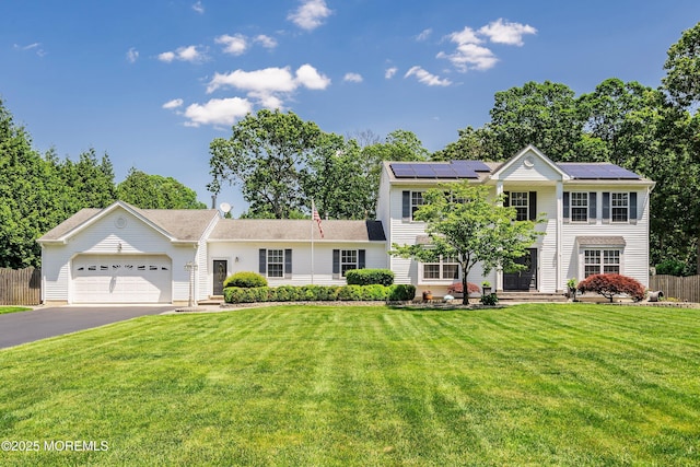 5 Persimmon Dr, Jackson, NJ 08527 - view of front of property with driveway, an attached garage, and solar panels
