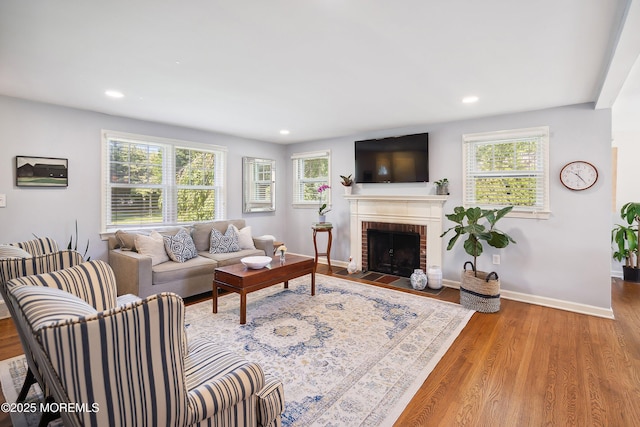 177 Cambridge Ave, Fair Haven, NJ 07704 - living area featuring plenty of natural light, wood finished floors, a brick fireplace, and recessed lighting