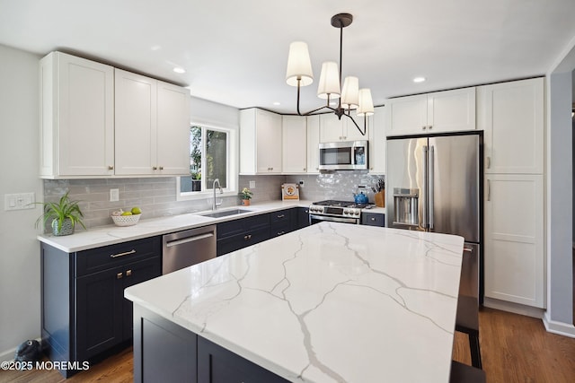 177 Cambridge Ave, Fair Haven, NJ 07704 - kitchen with stainless steel appliances, dark wood finished floors, backsplash, white cabinets, and recessed lighting