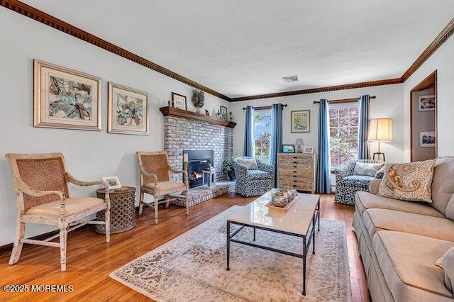 1304 Lenape Trl, Manasquan, NJ 08736 - living room featuring ornamental molding, wood finished floors, and a brick fireplace