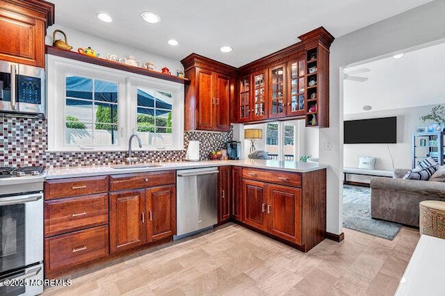 1304 Lenape Trl, Manasquan, NJ 08736 - kitchen featuring stainless steel appliances, a sink, healthy amount of natural light, open floor plan, and recessed lighting