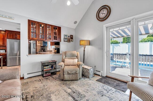 1304 Lenape Trl, Manasquan, NJ 08736 - living area with a baseboard heating unit, lofted ceiling, and a ceiling fan