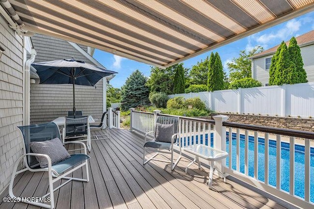 1304 Lenape Trl, Manasquan, NJ 08736 - wooden deck featuring a fenced backyard and outdoor dining space