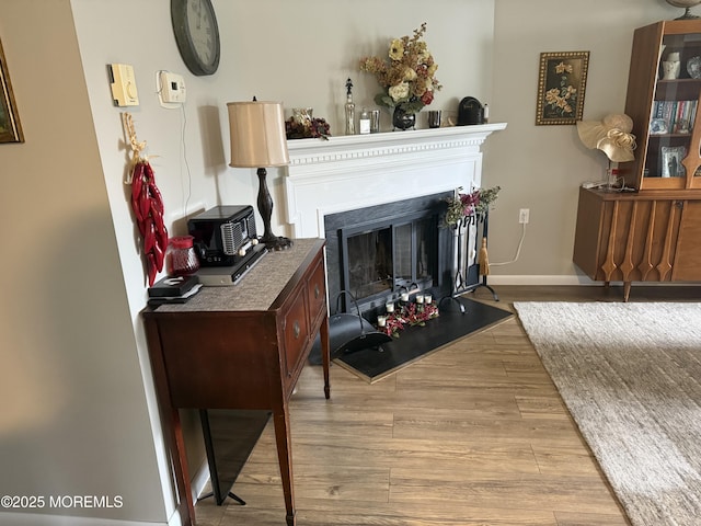 2 Cottage Ct Unit A, Whiting, NJ 08759 - living area featuring light wood-type flooring, a fireplace, and baseboards