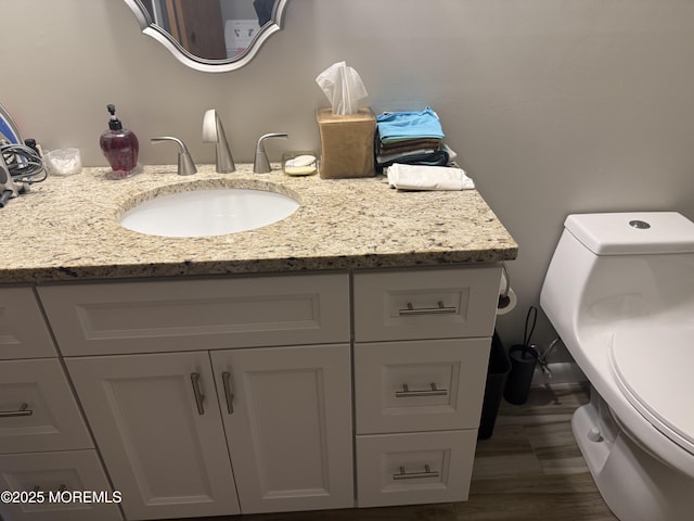2 Cottage Ct Unit A, Whiting, NJ 08759 - bathroom with vanity, toilet, and wood finished floors