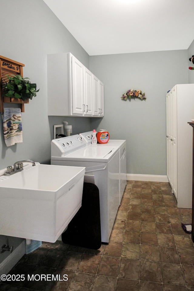 7 John Adams Ct, Whiting, NJ 08759 - washroom with cabinet space, independent washer and dryer, baseboards, and dark stone finish flooring
