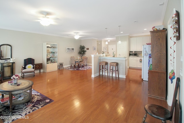7 John Adams Ct, Whiting, NJ 08759 - living area with a ceiling fan, wood finished floors, ornamental molding, recessed lighting, and baseboards