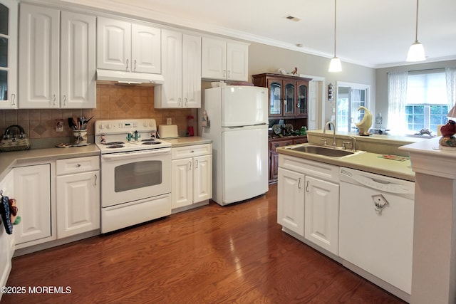 7 John Adams Ct, Whiting, NJ 08759 - kitchen with white appliances, a sink, under cabinet range hood, ornamental molding, and white cabinetry