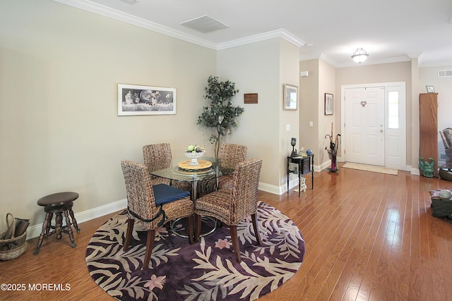 7 John Adams Ct, Whiting, NJ 08759 - dining area featuring wood-type flooring, crown molding, and baseboards