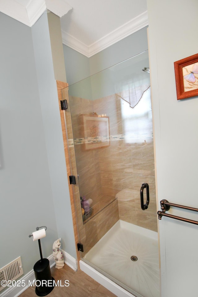 7 John Adams Ct, Whiting, NJ 08759 - full bathroom featuring crown molding, a shower stall, baseboards, and wood finished floors