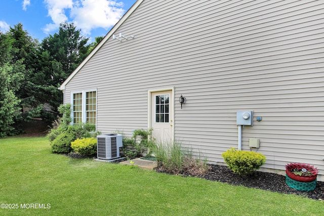 7 John Adams Ct, Whiting, NJ 08759 - view of side of property with cooling unit and a lawn