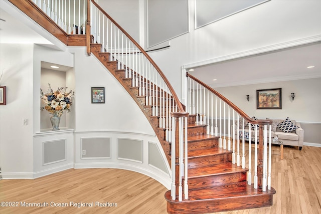 11 Elkridge Way, Manalapan, NJ 07726 - staircase with a high ceiling, wood finished floors, recessed lighting, baseboards, and ornamental molding