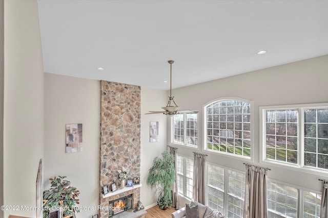 11 Elkridge Way, Manalapan, NJ 07726 - living room with plenty of natural light, a fireplace, recessed lighting, and wood finished floors
