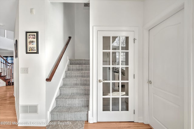 11 Elkridge Way, Manalapan, NJ 07726 - stairway with wood finished floors and baseboards