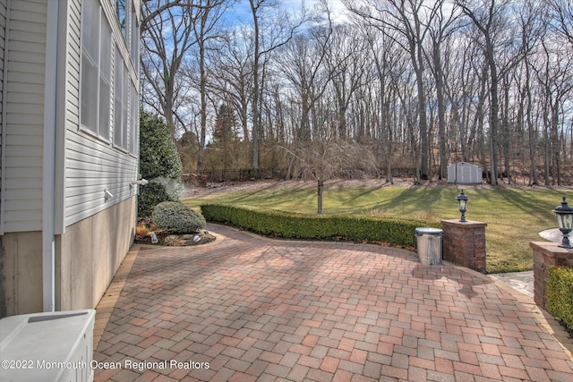 11 Elkridge Way, Manalapan, NJ 07726 - view of patio with view of wooded area