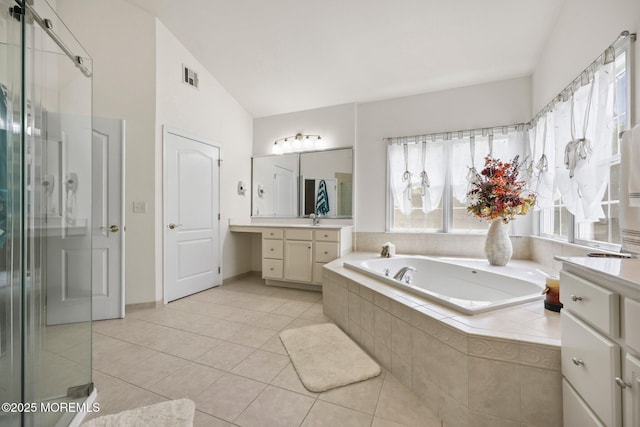 11 Elkridge Way, Manalapan, NJ 07726 - full bathroom with vanity, a garden tub, a shower stall, tile patterned floors, and lofted ceiling