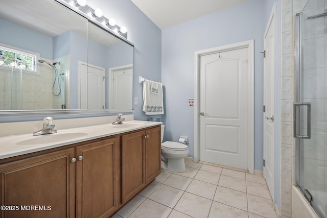 11 Elkridge Way, Manalapan, NJ 07726 - bathroom featuring double vanity, tile patterned flooring, and toilet