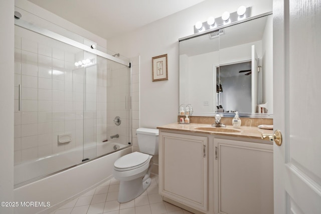 11 Elkridge Way, Manalapan, NJ 07726 - bathroom with tile patterned floors, vanity, toilet, and combined bath / shower with glass door