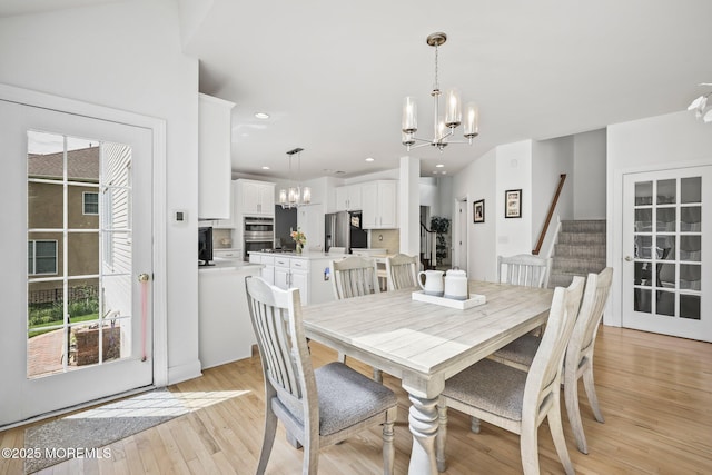 11 Elkridge Way, Manalapan, NJ 07726 - dining room featuring a chandelier, light wood finished floors, stairway, and recessed lighting