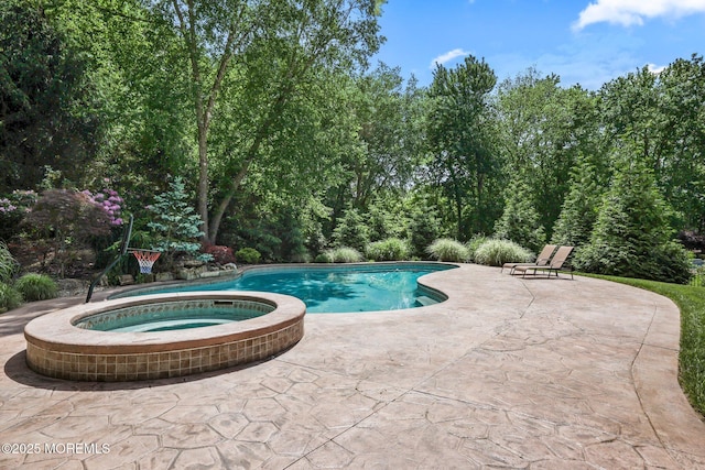 11 Elkridge Way, Manalapan, NJ 07726 - view of pool featuring a patio and a pool with connected hot tub