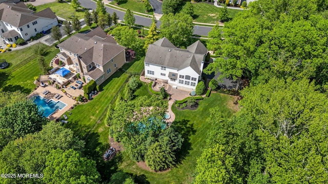 11 Elkridge Way, Manalapan, NJ 07726 - aerial perspective of suburban area featuring a pool area