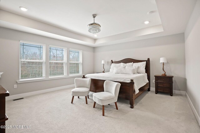 30 Heliport Dr, Tinton Falls, NJ 07724 - bedroom featuring light carpet, baseboards, recessed lighting, and a tray ceiling