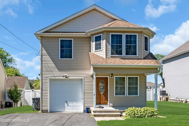 9 Fullerton Dr, Brick, NJ 08723 - view of front of home with driveway, an attached garage, a shingled roof, and central air condition unit