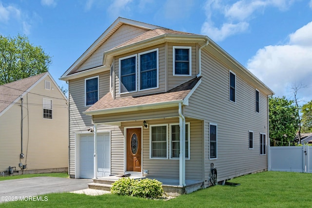 9 Fullerton Dr, Brick, NJ 08723 - view of front facade with a shingled roof, driveway, a garage, and covered porch