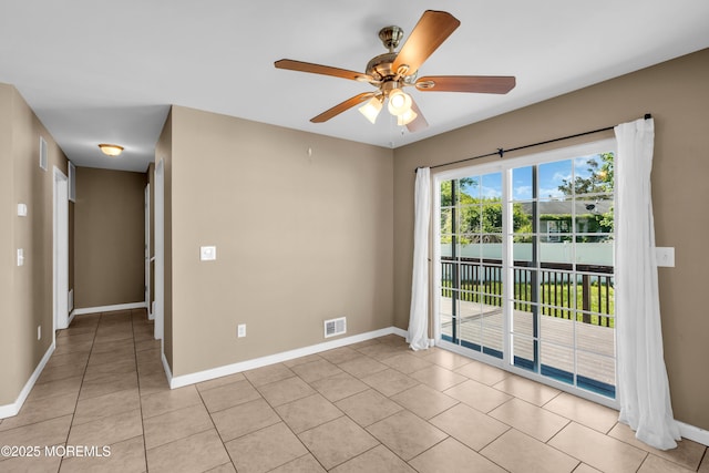 9 Fullerton Dr, Brick, NJ 08723 - empty room featuring light tile patterned flooring, a ceiling fan, and baseboards