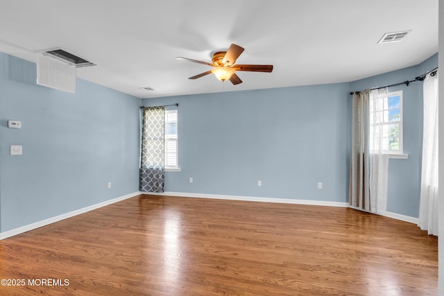 9 Fullerton Dr, Brick, NJ 08723 - empty room featuring ceiling fan, healthy amount of natural light, wood finished floors, and baseboards