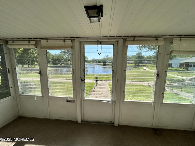 246B Jefferson Ct, Lakewood, NJ 08701 - unfurnished sunroom featuring a water view and carpet floors