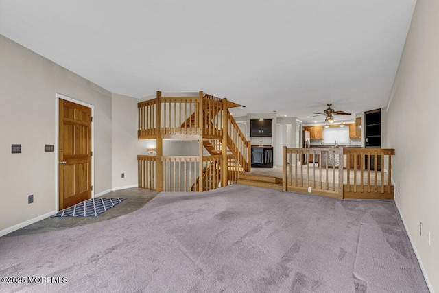 3 Black Pine Ln, Brielle, NJ 08730 - unfurnished living room with ceiling fan, carpet, and baseboards