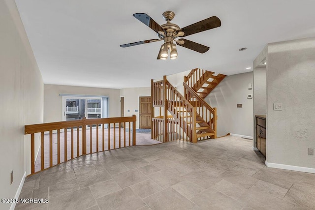 3 Black Pine Ln, Brielle, NJ 08730 - unfurnished room featuring a ceiling fan, baseboards, and stone finish flooring