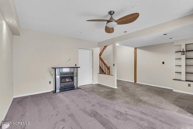 3 Black Pine Ln, Brielle, NJ 08730 - unfurnished living room with ceiling fan, stairway, baseboards, carpet floors, and a glass covered fireplace