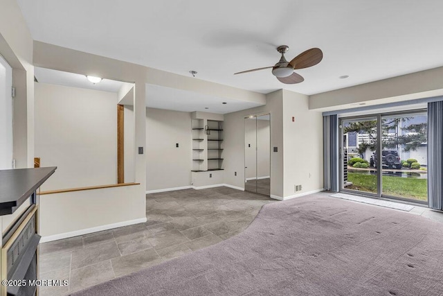 3 Black Pine Ln, Brielle, NJ 08730 - unfurnished living room featuring ceiling fan, baseboards, and elevator