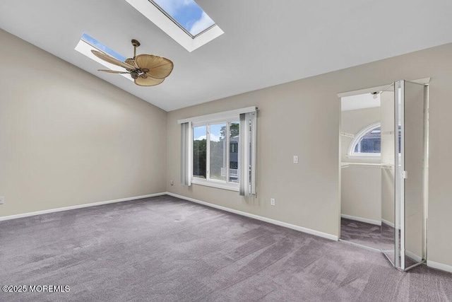 3 Black Pine Ln, Brielle, NJ 08730 - unfurnished room featuring a skylight, vaulted ceiling, carpet flooring, and baseboards